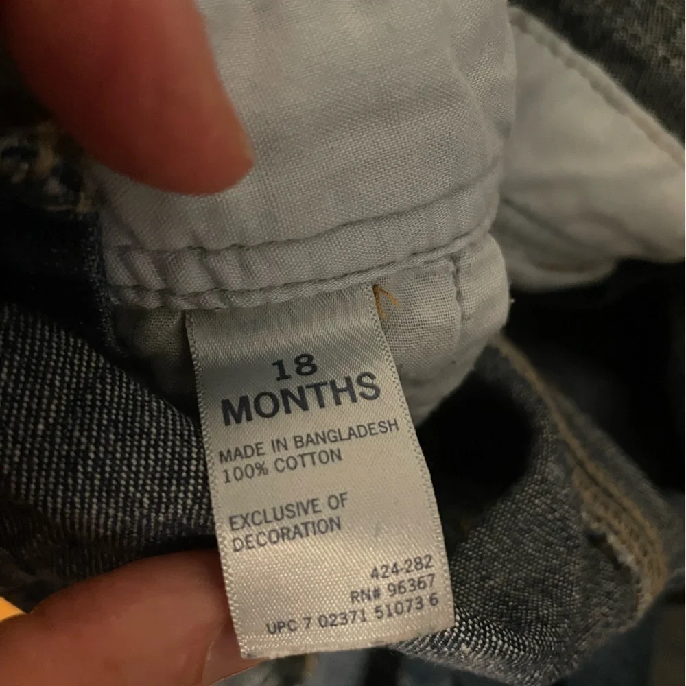 Osh Kosh Denim overalls with patches and spell out